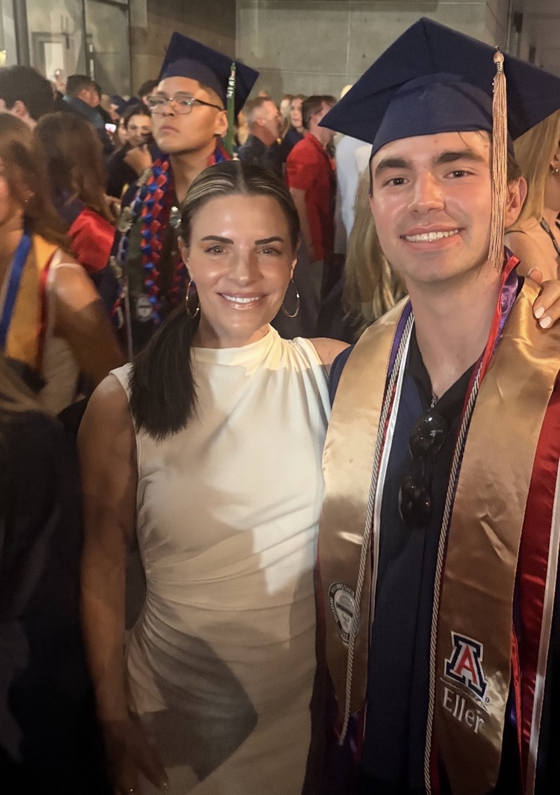 Candice with her son at his high school graduation
