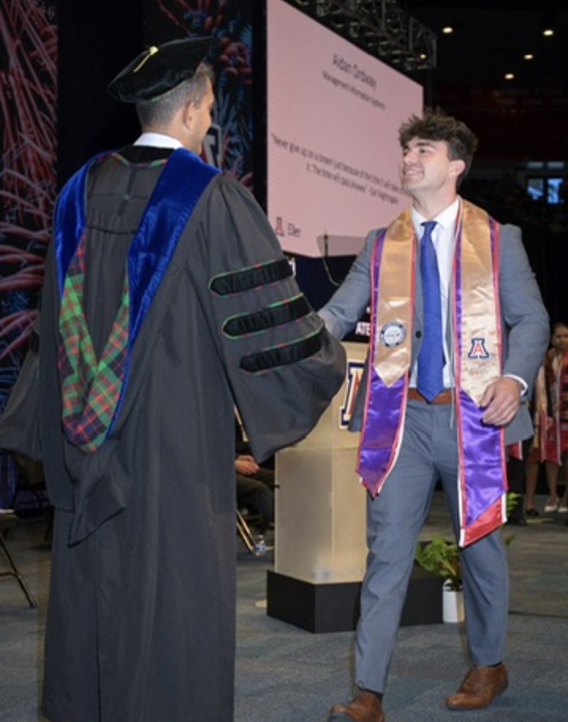 Candice's son walking the graduation stage at University of Arizona